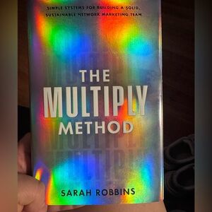 The Multiply Method Book with Rainbow Holographic cover